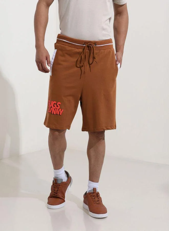 ذا انديان كراج كو Men Oversized Fit Bugs Bunny Printed Side Pocket Mid-Rise Shorts